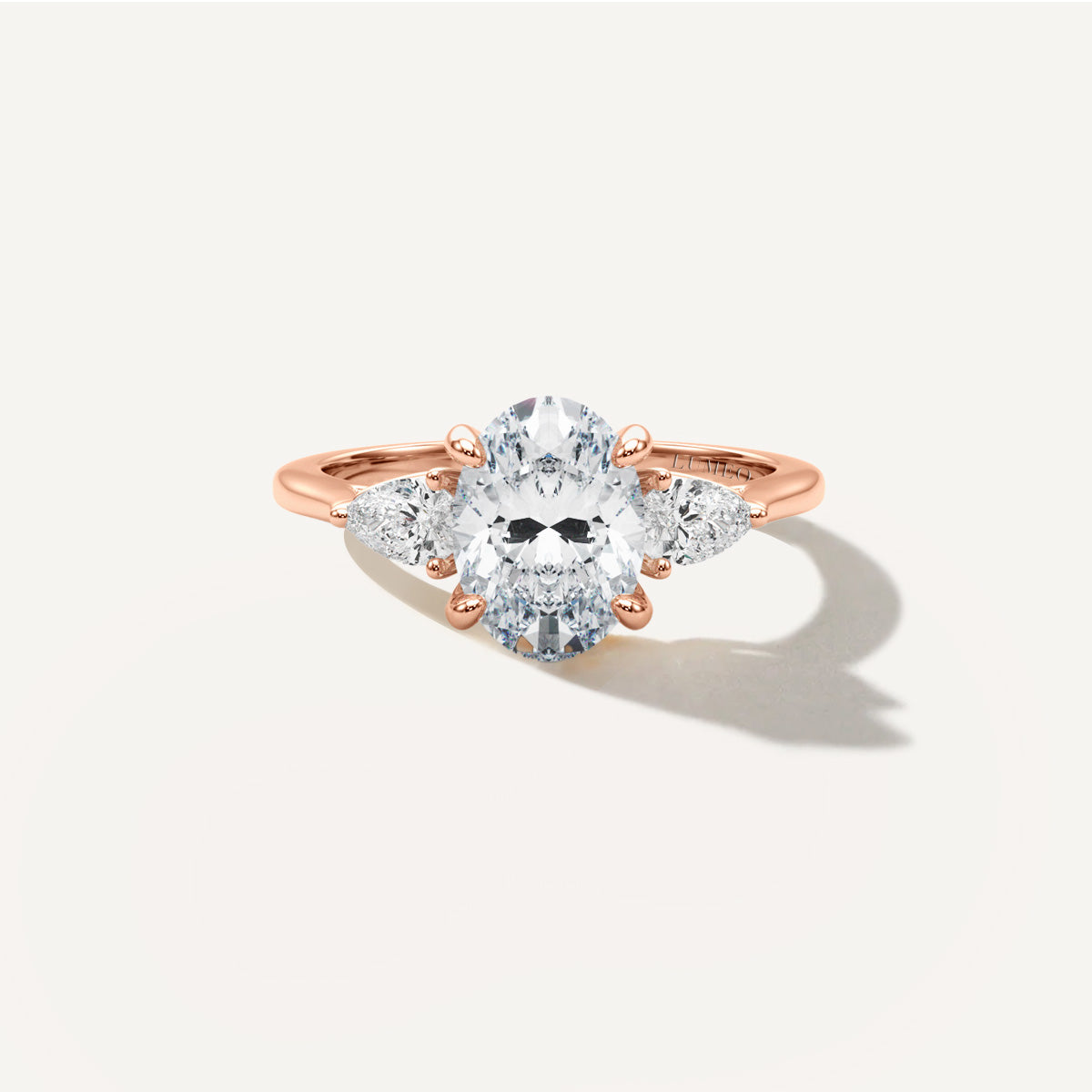LUMEO Oval Three Stone Diamond Engagement Ring Front View in 18k Solid Rose Gold