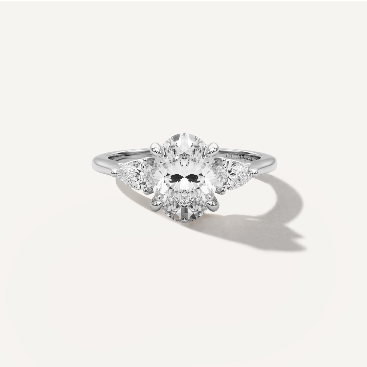 LUMEO Oval Three Stone Diamond Engagement Ring Front View in Platinum