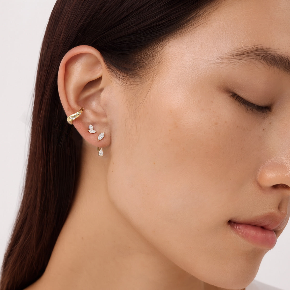 LUMEO Amelia Marquise & Pear Toi et Moi Earrings on model in 18k Solid Yellow Gold