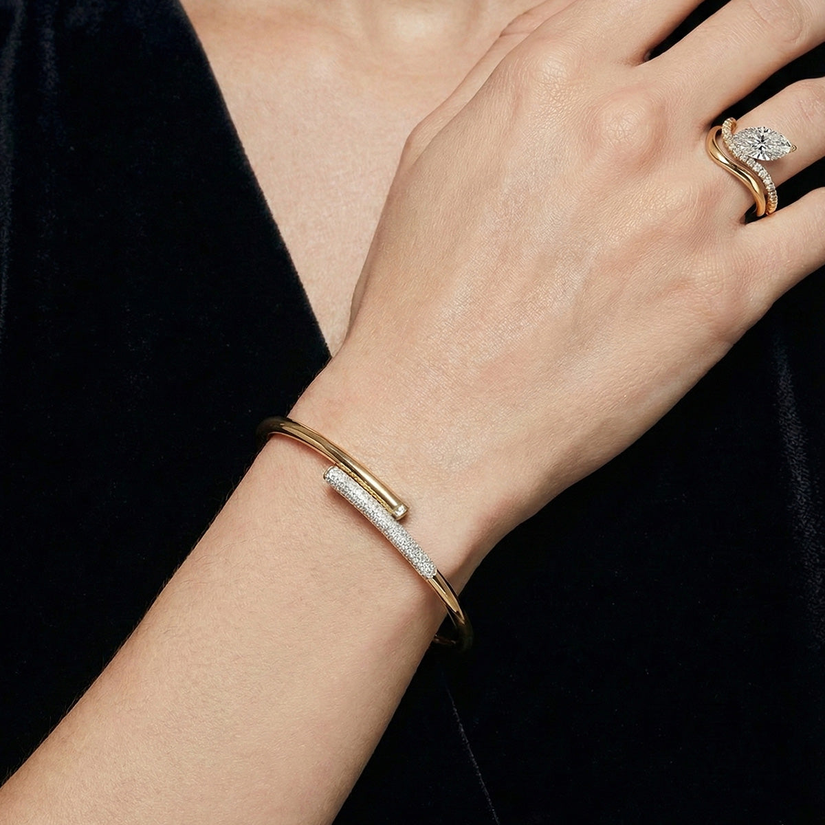LUMEO The Aurelia Bypass Bangle 18k Solid Yellow Gold on model
