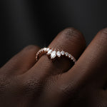 LUMEO Keira Chevron Wedding Band in 18k Solid Rose Gold on model