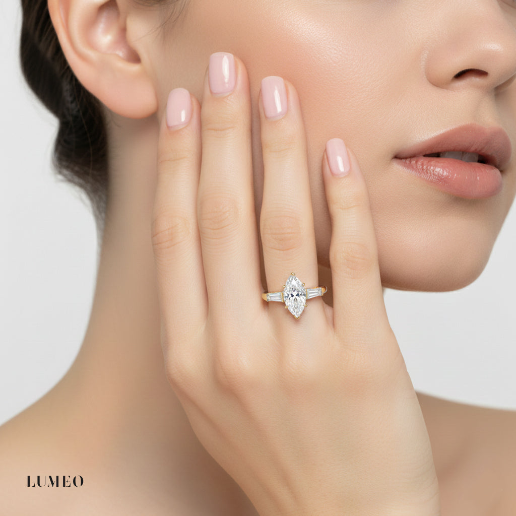 Marquise Three Stone Diamond Engagement Ring on model in 18k Solid Yellow Gold 