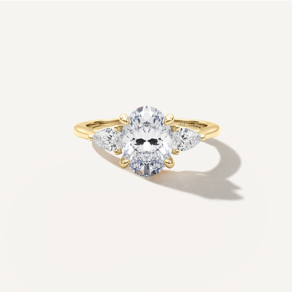 LUMEO Oval Three Stone Diamond Engagement Ring Front View in 18k Solid Yellow Gold 