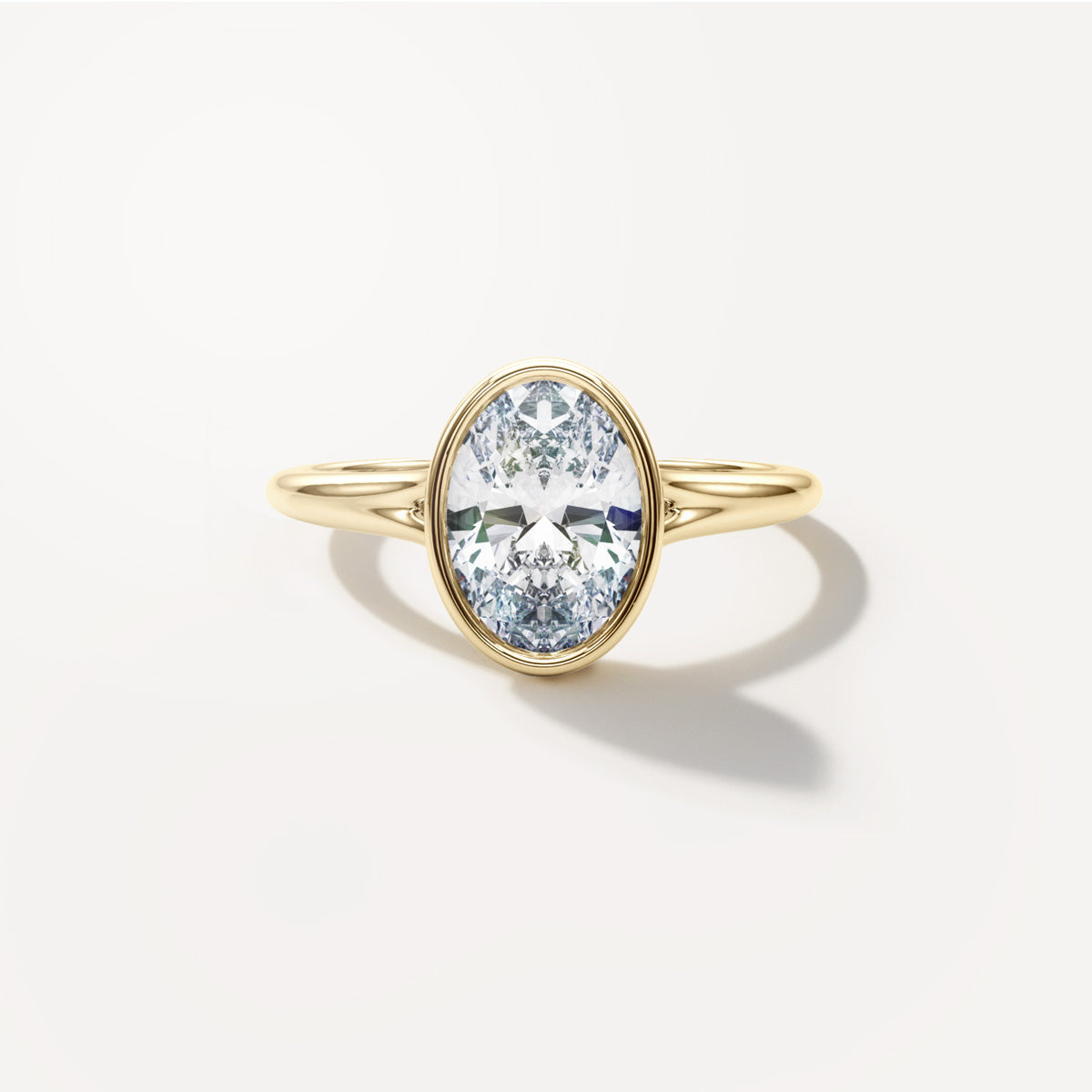 Oval Bezel Diamond Engagement Ring Front View in 18k Solid Yellow Gold 