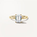 LUMEO Emerald Solitaire with Contemporary Shank Diamond Engagement Ring Front View in 18k Solid Yellow Gold 