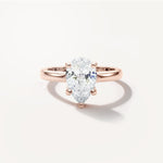 LUMEO Pear Solitaire with Contemporary Shank Diamond Engagement Ring Front View in 18k Solid Rose Gold 