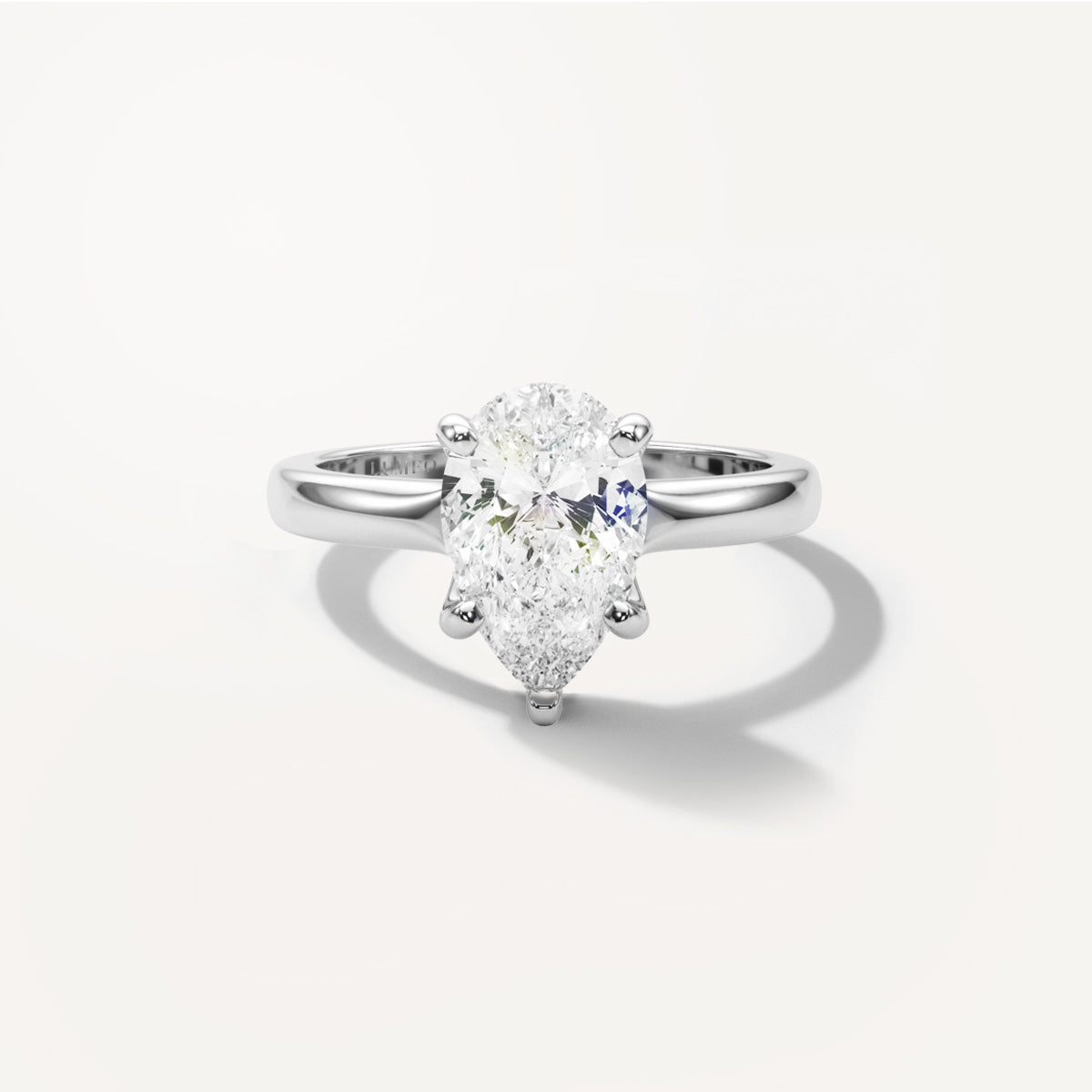 LUMEO Pear Solitaire with Contemporary Shank Diamond Engagement Ring Front View in Platinum or 18k Solid White Gold 