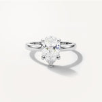 LUMEO Pear Solitaire with Contemporary Shank Diamond Engagement Ring Front View in Platinum or 18k Solid White Gold 