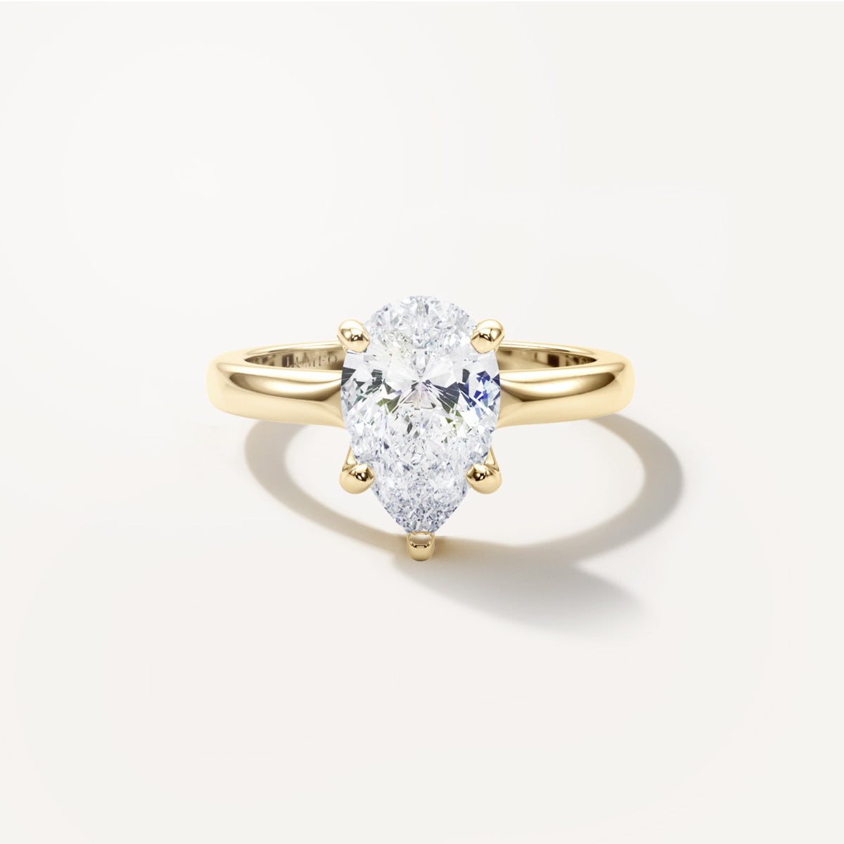 LUMEO Pear Solitaire with Contemporary Shank Diamond Engagement Ring Front View in 18k Solid Yellow Gold 