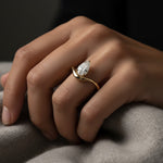 LUMEO Pear Diamond Trace Ring Front View in 18k Solid Yellow Gold on hand