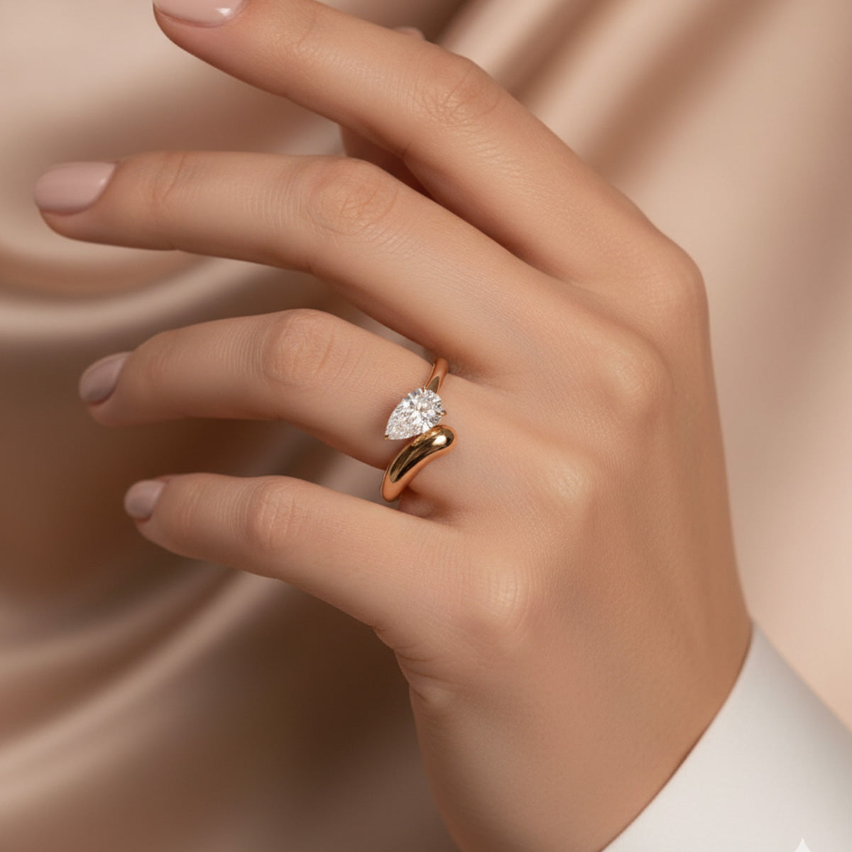 LUMEO Lissa Pear lab diamond ring on model in 18k solid yellow gold 