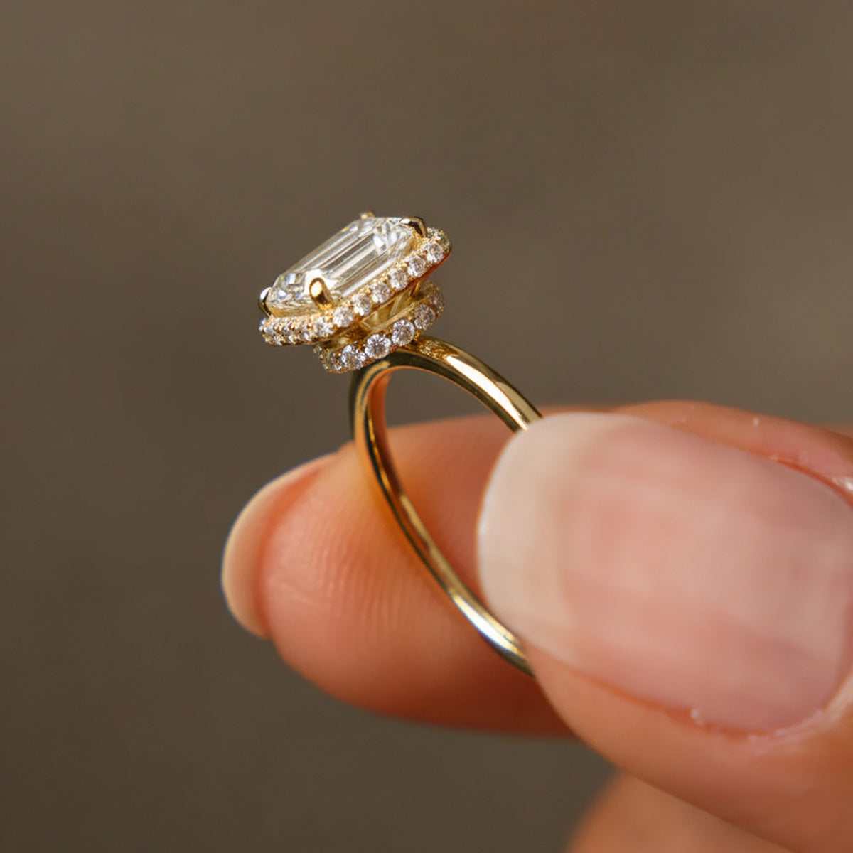 LUMEO Emerald Double Halo Diamond Engagement Ring with hand