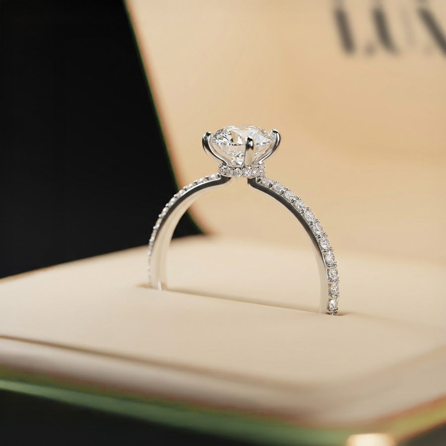 LUMEO Jewelry Diamond ring on a soft surface with a blurred background