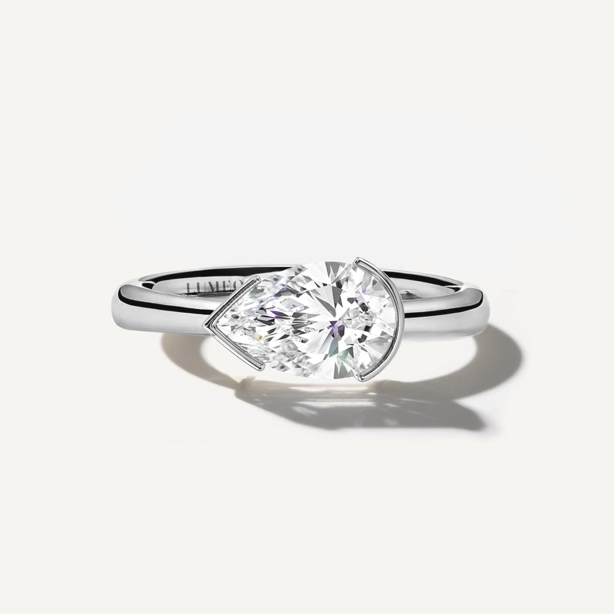 LUMEO The Blair Pear Bezel Diamond Engagement Ring Front View in Platinum or 18k Solid White Gold 