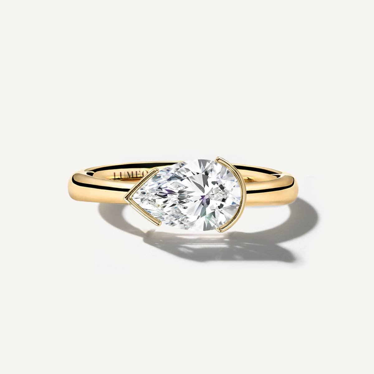 LUMEO The Blaire Pear Bezel Diamond Engagement Ring Front View in 18k Solid Yellow Gold 