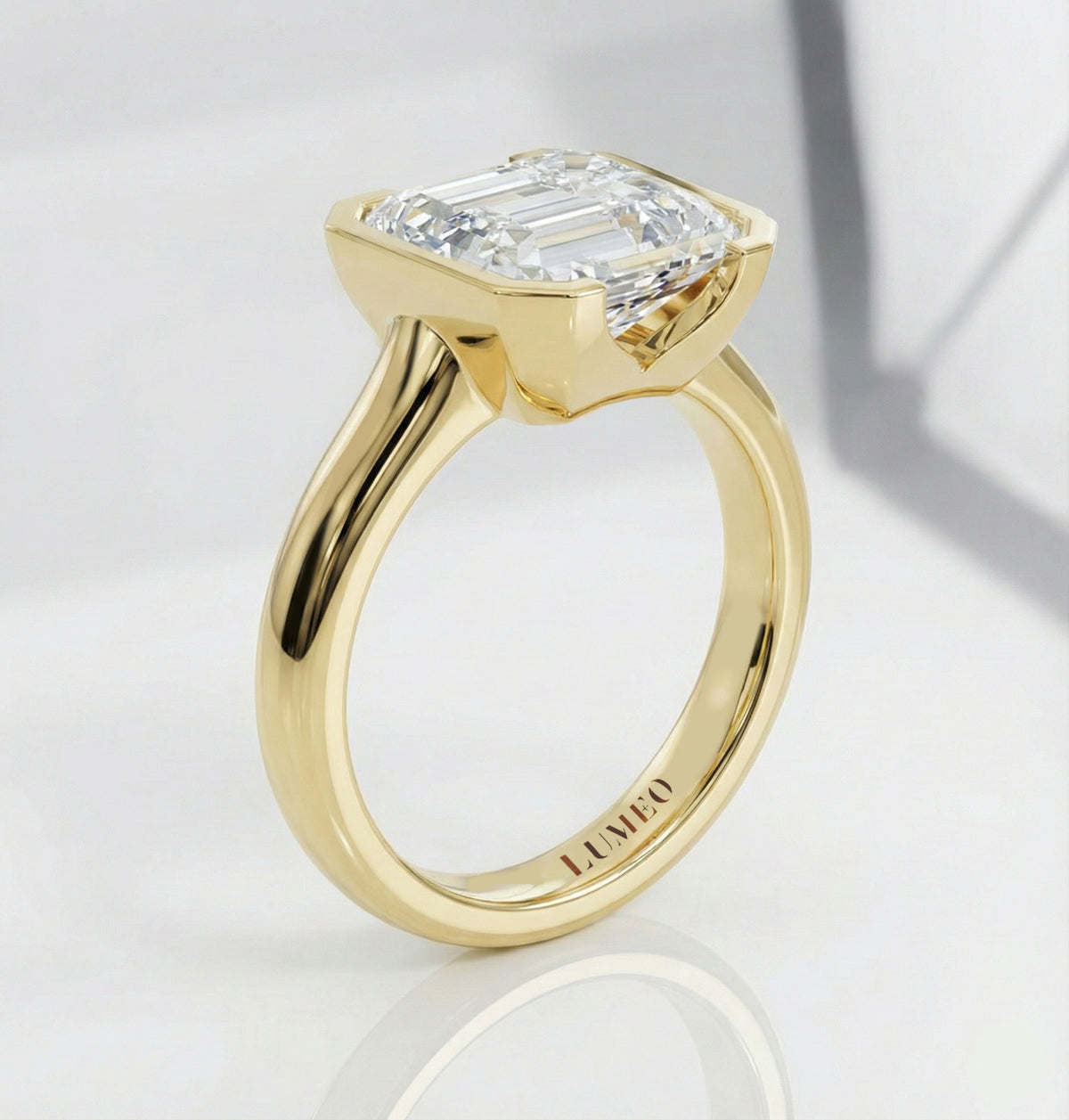 LUMEO The Blair Emerald Bezel Diamond Engagement Ring Side View in 18k Solid Yellow Gold 