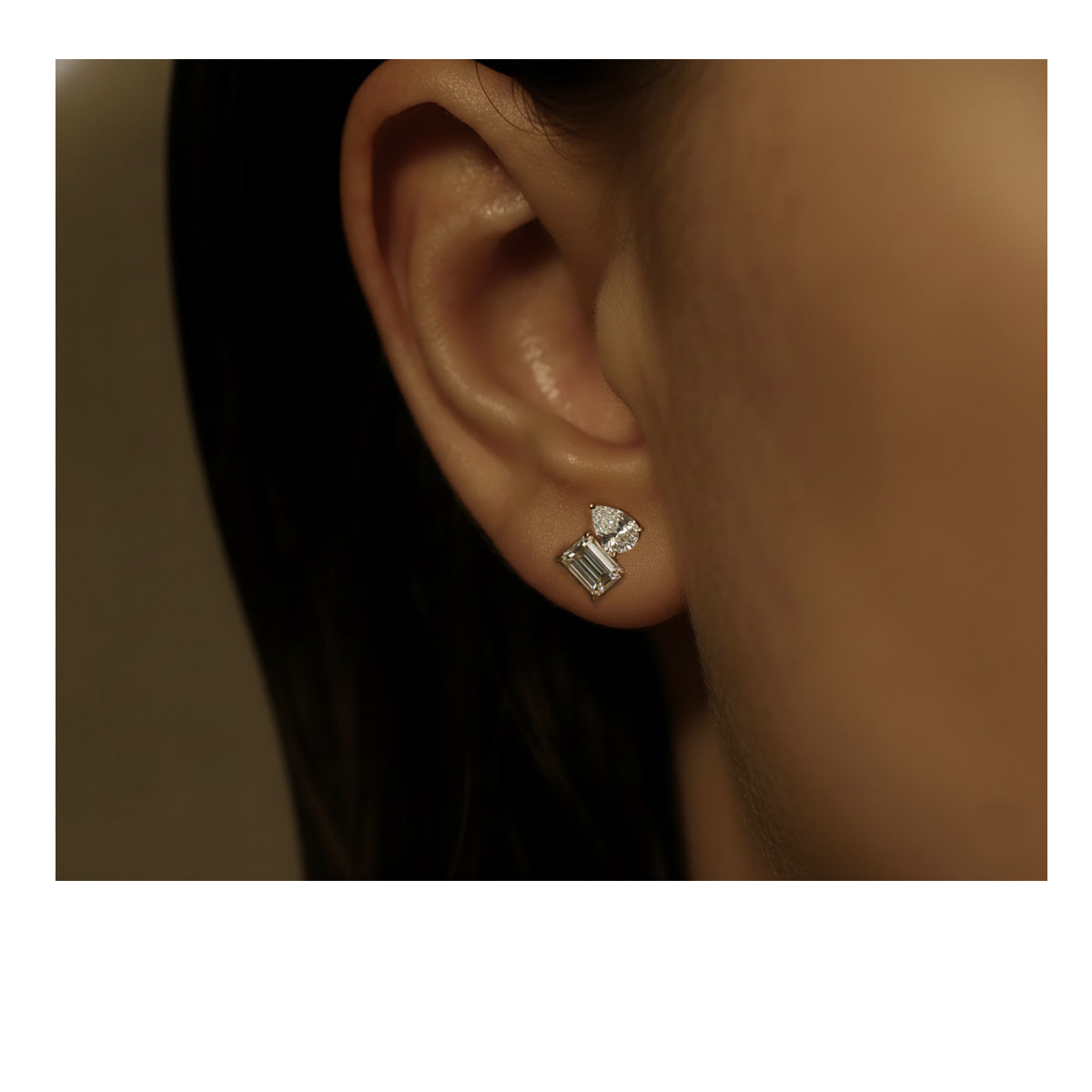 LUMEO Evelyn Pear & Emerald Toi et Moi Earrings front view in 18k Solid Yellow Gold on model