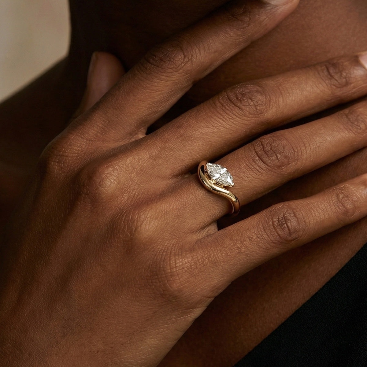LUMEO Marquise diamond ring in 18k solid yellow gold on hand