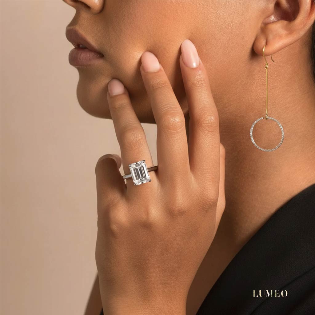 LUMEO Emerald Solitaire with Contemporary Shank Diamond Engagement Ring Video in Platinum