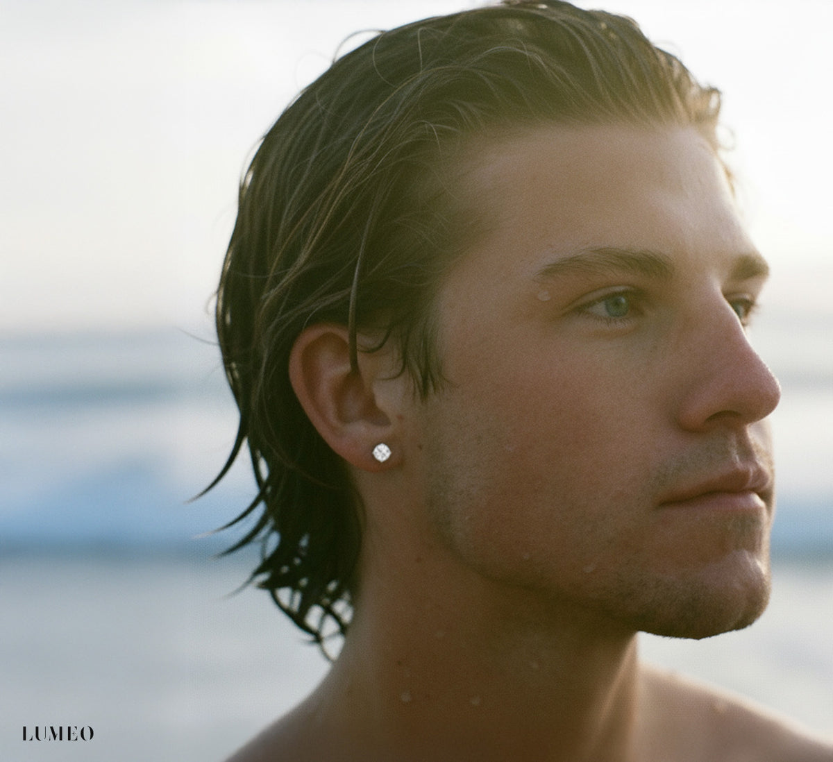 LUMEO Round Cut Ear Studs on male model in Platinum or 18k Solid White Gold 